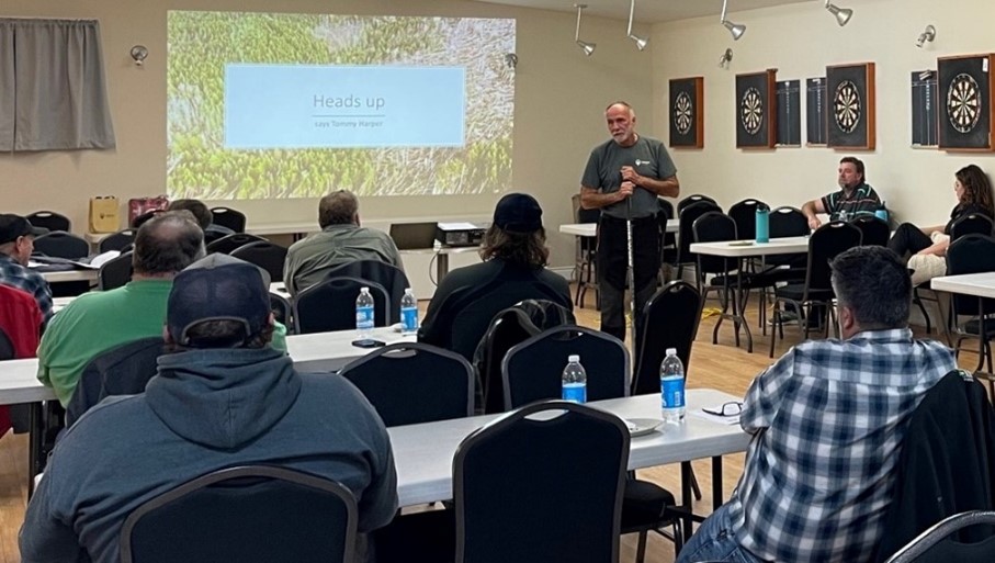 Participants listen to a presentation at a fall workshop.